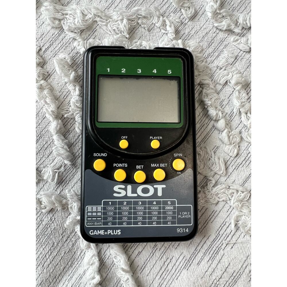 Vintage Radica Slot Handheld Electronic Game